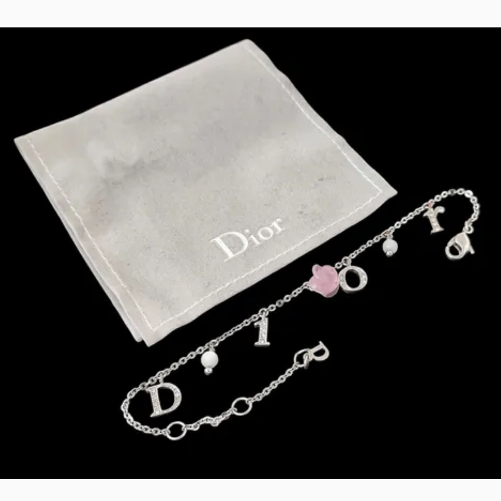 Christian Dior Silver Rose Motif and Rhinestone Logo
Bracelet - Picture 2 of 10